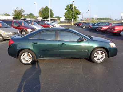 pontiac g6 2006 dk  green sedan gasoline 6 cylinders front wheel drive automatic 45342