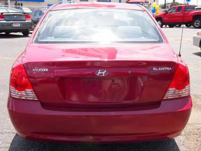 hyundai elantra 2005 red sedan gls 4 cylinders standard 78214