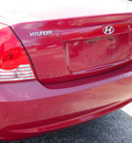 hyundai elantra 2005 red sedan gls 4 cylinders standard 78214