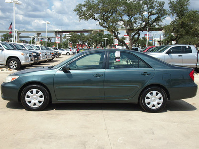 toyota camry 2002 dk  green sedan le gasoline 4 cylinders front wheel drive automatic 78232