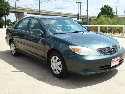 toyota camry 2002 dk  green sedan le gasoline 4 cylinders front wheel drive automatic 78232