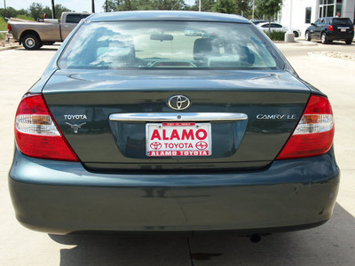 toyota camry 2002 dk  green sedan le gasoline 4 cylinders front wheel drive automatic 78232