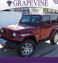 jeep wrangler 2012 red suv sahara gasoline 6 cylinders 4 wheel drive manual 76051