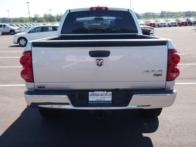 dodge ram 1500 2007 silver laramie gasoline 8 cylinders 4 wheel drive automatic with overdrive 76520