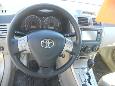 toyota corolla 2013 tan sedan le gasoline 4 cylinders front wheel drive automatic 75503