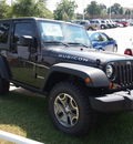 jeep wrangler 2013 brown suv rubicon gasoline 6 cylinders 4 wheel drive automatic 76210