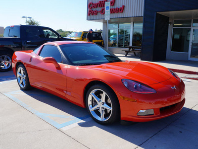 chevrolet corvette 2011 orange coupe gasoline 8 cylinders rear wheel drive 6 speed automatic 76210