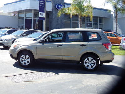 subaru forester 2009 gold suv 2 5 x gasoline 4 cylinders all whee drive 5 speed manual 94063