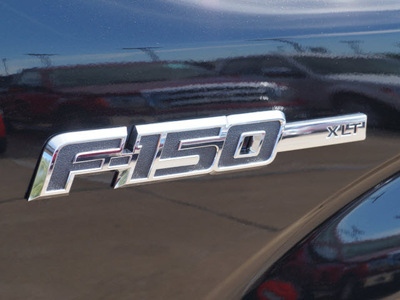 ford f 150 2013 black xlt gasoline 6 cylinders 4 wheel drive automatic 75062