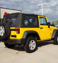 jeep wrangler 2011 yellow suv sport gasoline 6 cylinders 4 wheel drive 6 speed manual 76210