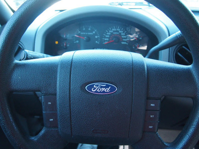ford f 150 2007 dk  blue pickup truck stx gasoline 8 cylinders rear wheel drive automatic 77515