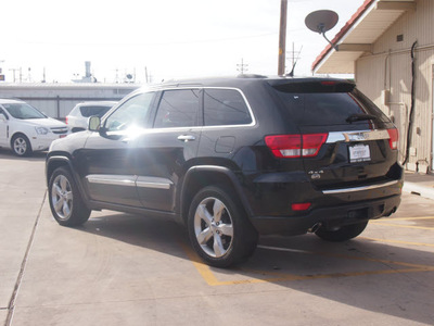 jeep grand cherokee 2011 black suv overland gasoline 8 cylinders 4 wheel drive automatic 79110