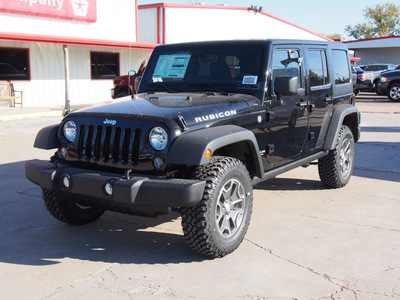 jeep wrangler unlimited 2014 black suv rubicon gasoline 6 cylinders 4 wheel drive automatic with overdrive 77864