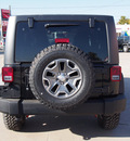 jeep wrangler unlimited 2014 black suv rubicon gasoline 6 cylinders 4 wheel drive automatic with overdrive 77864