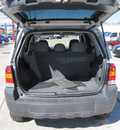 ford escape 2006 silver suv xlt gasoline 6 cylinders front wheel drive automatic 77379