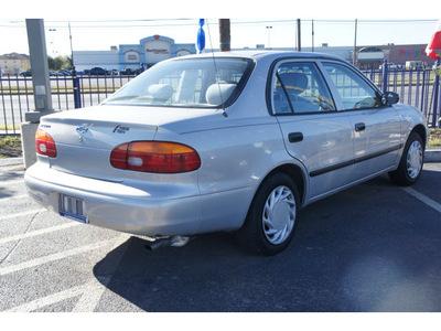 chevrolet prizm 2002 silver sedan 4 cylinders automatic 78217