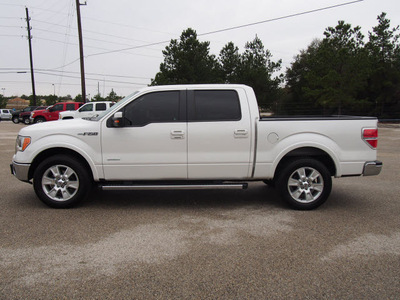 ford f 150 2011 white lariat gasoline 6 cylinders 2 wheel drive 6 speed automatic 77375