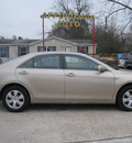 toyota camry 2009 tan sedan gasoline 4 cylinders front wheel drive automatic 77379