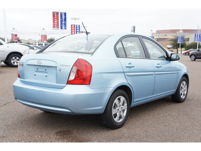 hyundai accent 2009 lt  blue sedan gls 4 cylinders automatic 78041