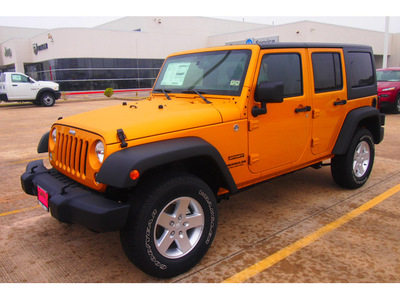 jeep wrangler unlimited 2014 brown suv sport gasoline 6 cylinders 4 wheel drive automatic 77375