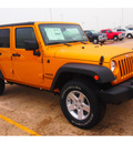 jeep wrangler unlimited 2014 brown suv sport gasoline 6 cylinders 4 wheel drive automatic 77375