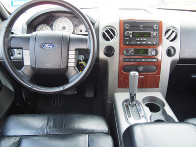 ford f 150 2005 red lariat 8 cylinders automatic 77505