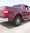 ford f 150 2005 red lariat 8 cylinders automatic 77505