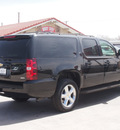 chevrolet suburban 2009 black suv lt 1500 flex fuel 8 cylinders 4 wheel drive automatic 79110