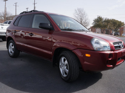 hyundai tucson 2006 orange suv gl gasoline 4 cylinders front wheel drive automatic 76234