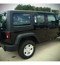 jeep wrangler unlimited 2014 black suv sport gasoline 6 cylinders 4 wheel drive automatic 77375