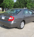 toyota camry 2004 gray sedan xle gasoline 4 cylinders front wheel drive automatic 77379