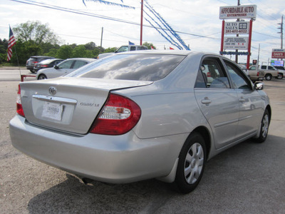 toyota camry 2003 silver sedan le gasoline 4 cylinders front wheel drive automatic 77379