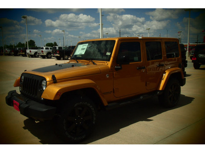 jeep wrangler unlimited 2014 brown suv altitude edition 6 cylinders automatic 77375