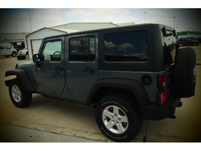 jeep wrangler unlimited 2014 gray suv sport 6 cylinders 6 speed manual 77375