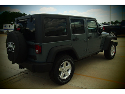 jeep wrangler unlimited 2014 gray suv sport 6 cylinders 6 speed manual 77375