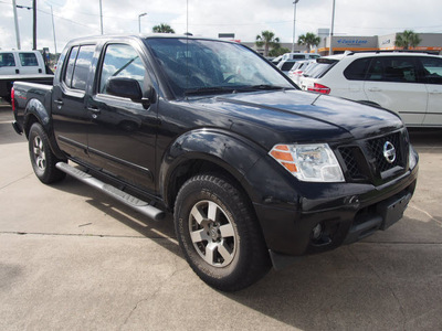 nissan frontier 2010 black pro 4x gasoline 6 cylinders 2 wheel drive automatic with overdrive 77539