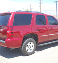 chevrolet tahoe 2011 red suv ls 8 cylinders automatic 79925
