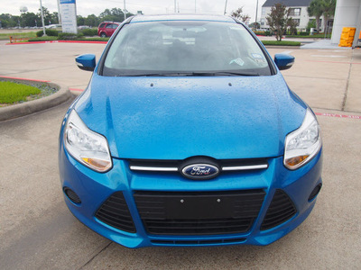 ford focus 2014 blue hatchback se flex fuel 4 cylinders front wheel drive automatic with overdrive 77539