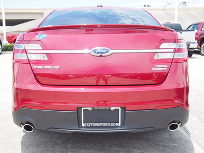 ford taurus 2014 red sedan sel 6 cylinders automatic 77521