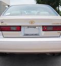 toyota camry 1998 gold sedan xle v6 6 cylinders automatic 77521