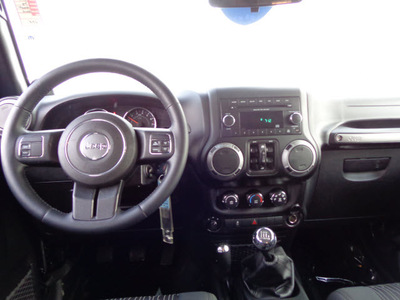 jeep wrangler unlimited 2012 black suv sport gasoline 6 cylinders 4 wheel drive 6 speed manual 60915