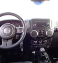 jeep wrangler unlimited 2012 black suv sport gasoline 6 cylinders 4 wheel drive 6 speed manual 60915