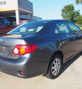toyota corolla 2010 dk  gray sedan le gasoline 4 cylinders front wheel drive automatic with overdrive 77539