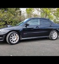 subaru impreza 2006 black sedan wrx sti gasoline 4 cylinders all whee drive 6 speed manual 97211