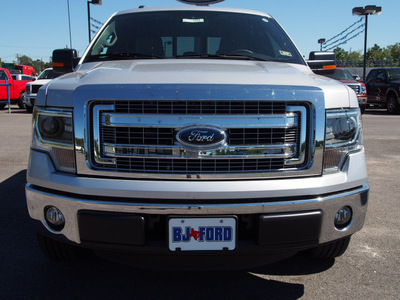 ford f 150 2014 silver xlt 8 cylinders automatic 77575