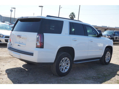 gmc yukon 2015 white suv sle 8 cylinders automatic 78853